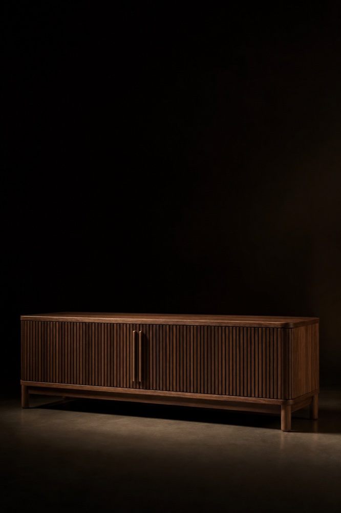 Low walnut sideboard with fluted doors