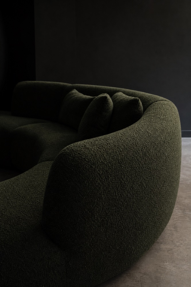 Along the curved back