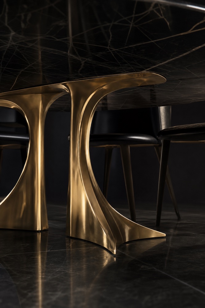 Sculptural brass base