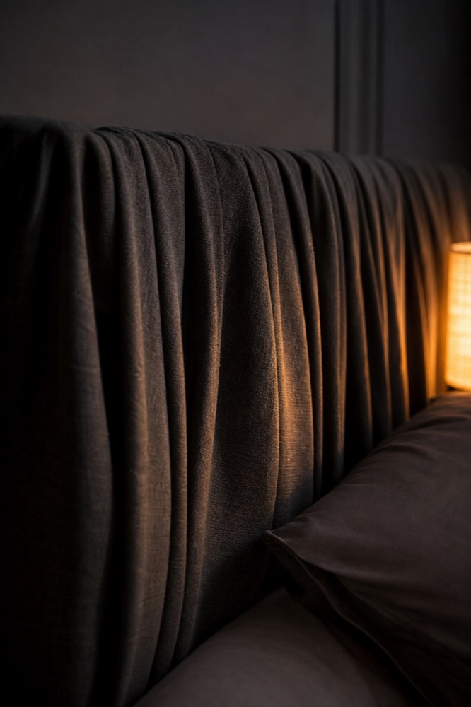 Headboard drape folds