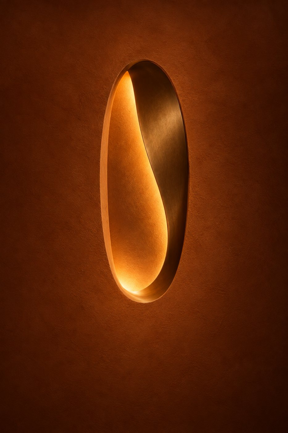 A recessed crescent of warm light in brown plaster
